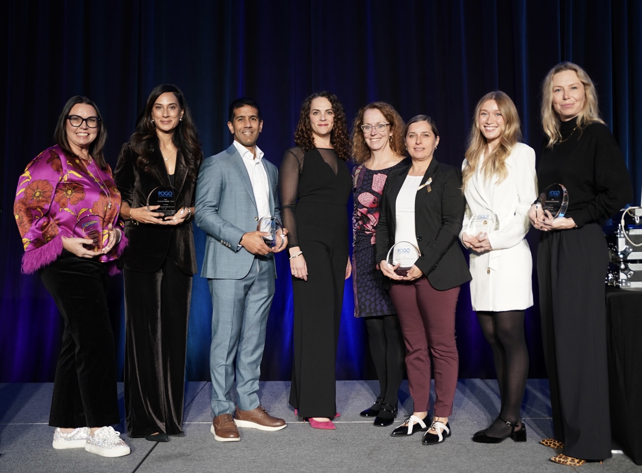Image of Recognition Awards recipients: Sumit Gupta, MD, PhD, FRCPC and Sue Zupanec, MN, NP Visionary Award (Team – Tie); Alisha Kassam, MD, MPH, FRCPC and the Southlake AYA Oncology Program Visionary Award (Team – Tie); Rebecca Mackenzie Community Partner Impact Award; Emma King BA, CHYS Early Career Professional; Lindsay Jibb, RN, Phd, CPHON Nursing Leadership Award. They are joined (centre) by POGO CEO Lauren Ettin and POGO Medical Director Donna Johnston.